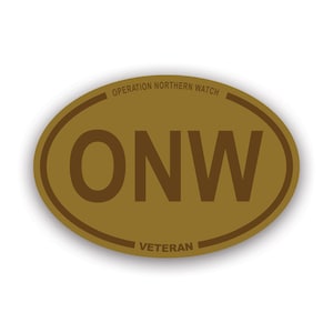 May include: A brown oval sticker with the text "OPERATION NORTHERN WATCH" and "VETERAN" in white. The sticker also has the text "ONW" in brown.