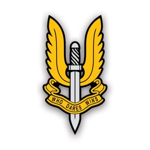 May include: A yellow winged emblem with a silver dagger and a ribbon that reads "Who Dares Wins".