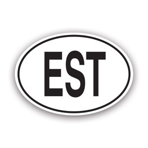 May include: White oval sticker with black text that reads "EST".