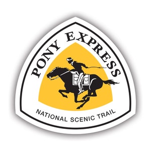 May include: A white, black, and yellow Pony Express National Scenic Trail sticker. The design features a silhouette of a rider on a galloping horse within a yellow triangle. The words "Pony Express" and "National Scenic Trail" are printed on the sticker.