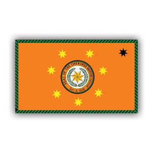 May include: The Cherokee Nation flag is orange with a green and black border. It features a central circle with the words "Seal of the Cherokee Nation" and "Sept. 6, 1839". Seven yellow stars surround the circle, and a black star is in the top right corner.