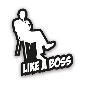 May include: Black and white silhouette of a person sitting in a chair with the text "LIKE A BOSS" below.