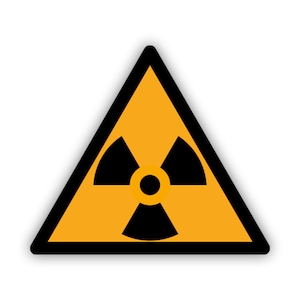May include: A yellow triangle warning sign with a black radiation symbol inside. The symbol is a stylized three-leaf clover with a black circle in the center.