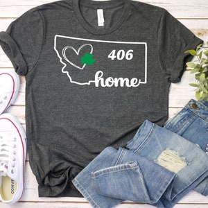 Camisa 406, camiseta doméstica do Dia de São Patrício Montana, camiseta masculina e feminina, camiseta, letra branca e design de logotipo