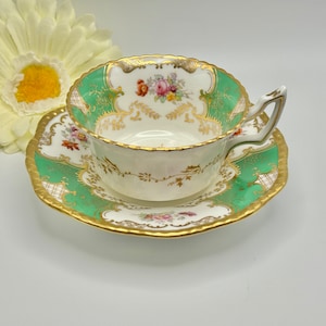 Coalport Batwing Teacup and Saucer Commissioned for Mortlocks London 1919