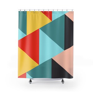 May include: Geometric shower curtain with a pattern of red, yellow, blue, green, and pink triangles.