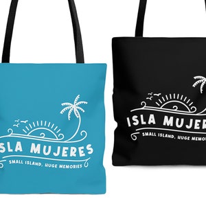 May include: Two tote bags, one turquoise and one black, each featuring a white graphic of a palm tree, sun, and the words "ISLA MUJERES" and "SMALL ISLAND, HUGE MEMORIES". The bags have black handles.
