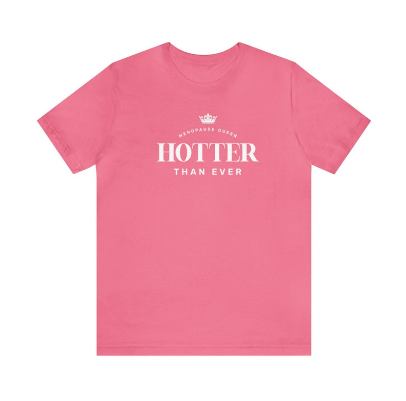 May include: Pink t-shirt with a white crown and the text "Menopause Queen" above the text "Hotter Than Ever".