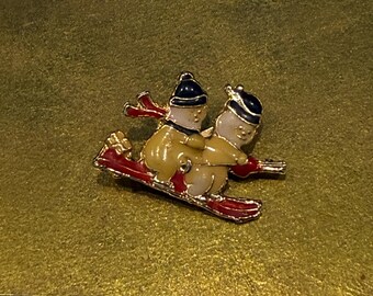 Vintage Enameled Snowmen Sledding Brooch - Gold Tone Christmas Holiday Pin - Retro Festive Winter Jewelry Gift