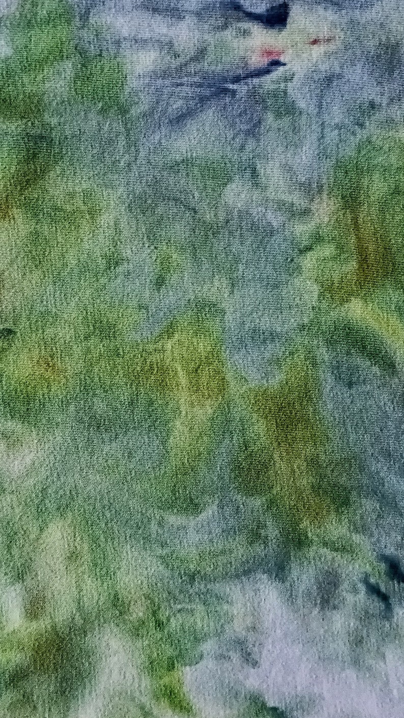 May include: Abstract watercolor painting on canvas with shades of green, blue, and gray. The paint has a textured look, creating a unique and artistic effect.