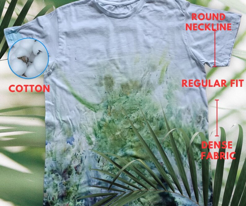 May include: A white cotton t-shirt with a round neckline and a regular fit. The shirt has a tie-dye pattern with green, blue, and white colors. The fabric is dense and has a textured look.