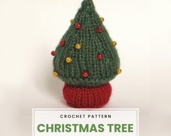 May include: A green knitted Christmas tree with red and gold beads, standing on a red base. CROCHET PATTERN CHRISTMAS TREE.