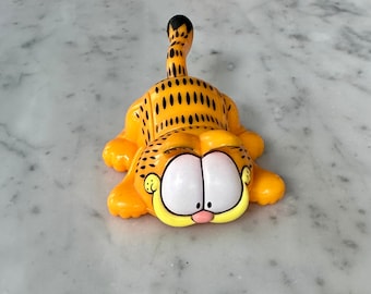 Stara plastikowa zabawka Garfield z ukrytą lupą