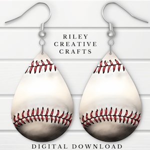 May include: A pair of dangle earrings featuring a white baseball with red stitching. The earrings are silver and have a teardrop shape.