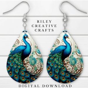 May include: A pair of teardrop-shaped earrings featuring a peacock with blue and green feathers on a white background with brown floral accents. The earrings are silver and have a hook closure.