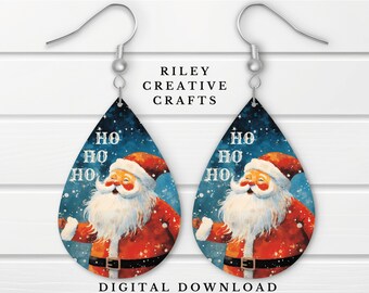 May include: A pair of dangle earrings featuring a watercolor illustration of Santa Claus with the text "Ho Ho Ho" on a blue background with white snowflakes.