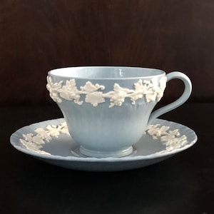Wedgwood Queensware Embossed White on Blue Tea Cup and Saucer