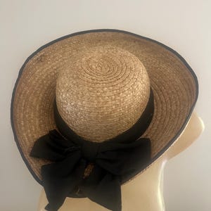 Vintage straw summer sun hat with black ribbon
