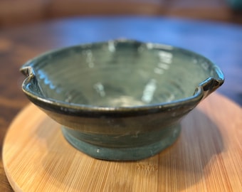 small decorative stoneware pottery bowl variegated blue tones