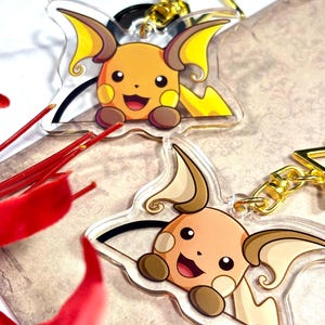 Shiny Double-sided Peeking Charm | Cute 2” Acrylic Raichu Fanart Keychain