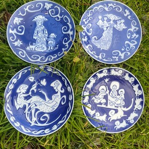 The most amazing collection of 4 Mother's Day plates from Royal Copenhagen 1971-1974.