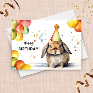 Karta urodzinowa królika, czapka urodzinowa i balony, portret królika Mini Lop, prezent od królika, kolorowa ilustracja akwarelowa