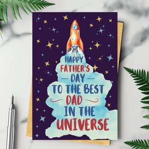 Biglietto d'auguri per la festa del papà con razzo spaziale, razzo spaziale che decolla nello spazio circondato dalle stelle, auguri per la festa del papà, il miglior papà dell'universo