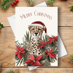 Gepard Weihnachtskarte, Trägt einen Nikolaushut und rote Weihnachtsstern-Girlande, Zoo Safari Katze Wildtier Urlaub Geschenk, Aquarell Kunst Illustration
