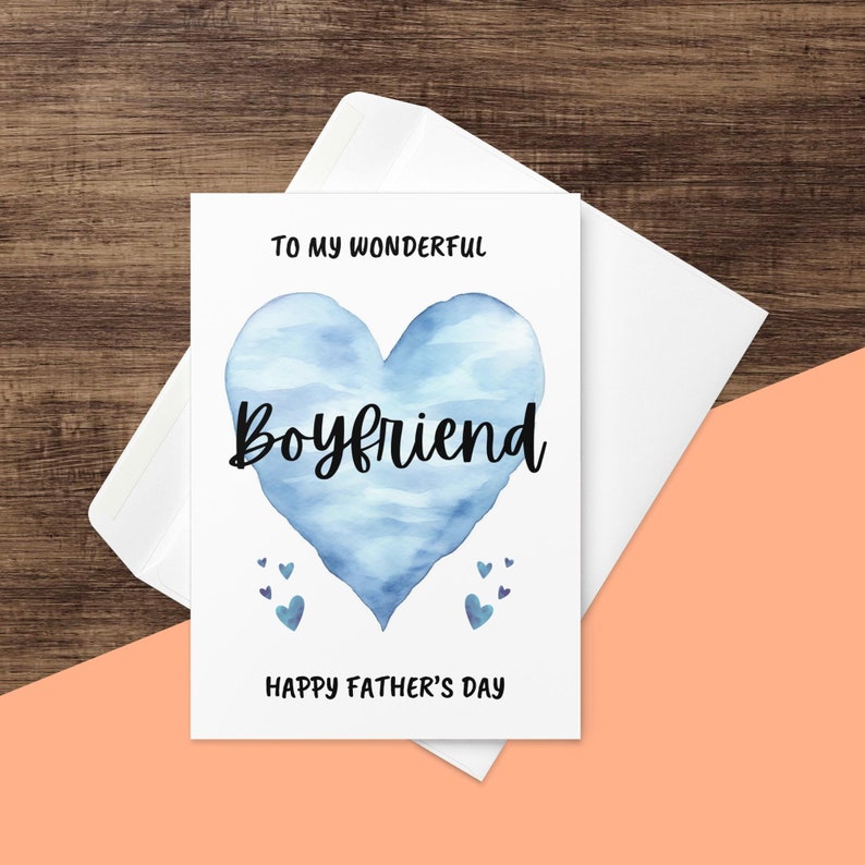 May include: A white card with a blue watercolor heart that says "To my wonderful Boyfriend" and "Happy Father's Day".