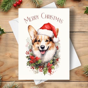 Corgis Weihnachtskarte, Trägt eine Weihnachtsmütze und einen roten Weihnachtsstern-Kranz, niedliche Corgis Karte, Vintage Haustier Hund Porträt, Aquarell Kunst Illustration