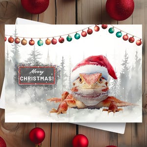 Bartagame Weihnachtskarte, Frohe Weihnachten Eidechse Trägt eine Weihnachtsmütze in einer verschneiten winterlichen Szene, Weihnachtsgeschenk, Aquarell Illustration