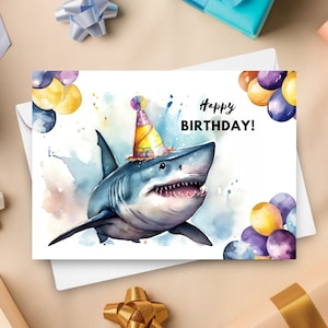 サメの誕生日カード、パーティーハット、誕生日おめでとう、ホオジロザメのギフト、水族館の誕生日、海の生き物のグリーティングカード、水彩イラスト