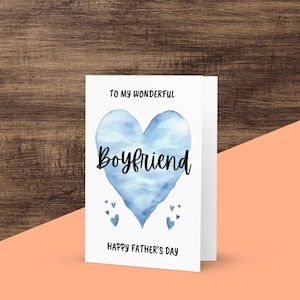 May include: A white card with a blue watercolor heart that says "Boyfriend" inside. The card also says "To my wonderful" at the top and "Happy Father's Day" at the bottom.