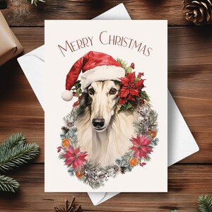 Cartão de Natal Borzoi, Chapéu de Papai Noel e Guirlanda de Poinsétia Vermelha, Cena de Inverno Nevado, Cão de Caça Russo, Ilustração de Arte em Aquarela