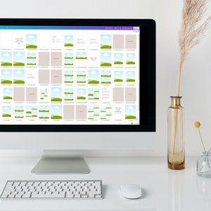 May include: A computer screen shows a design layout with multiple image placeholders and text boxes. The screen displays a variety of mockups with landscape images and text. A keyboard, mouse, and decorative vases are in the foreground.