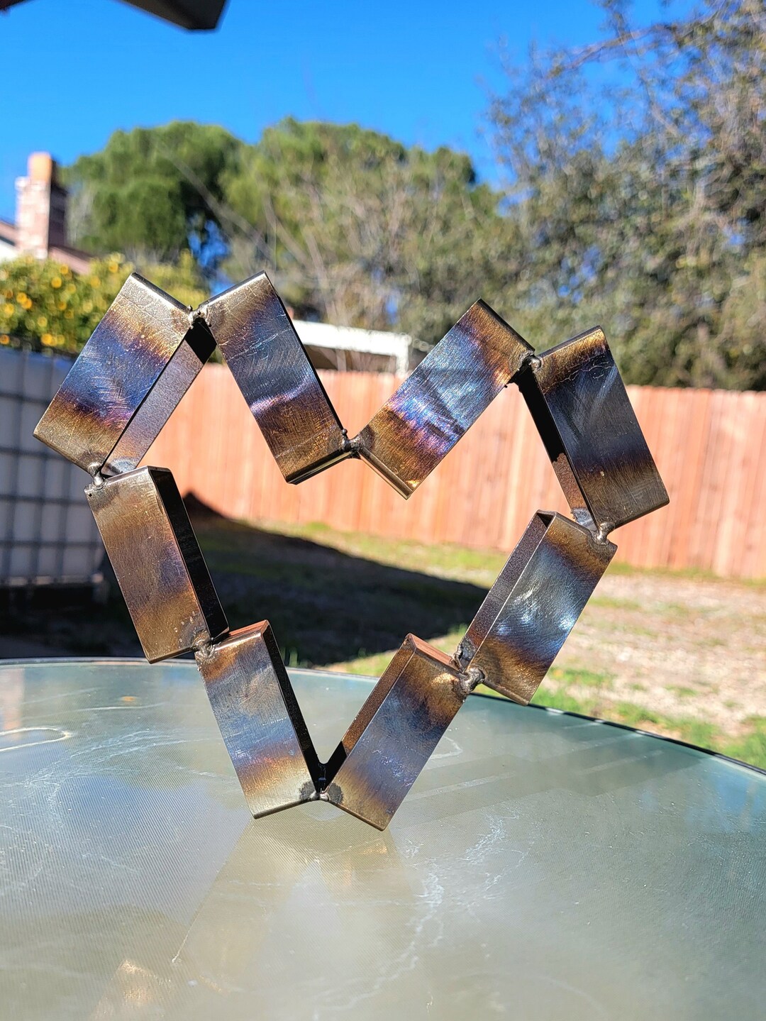 The maker of Love Metal Art Sculpture Etsy