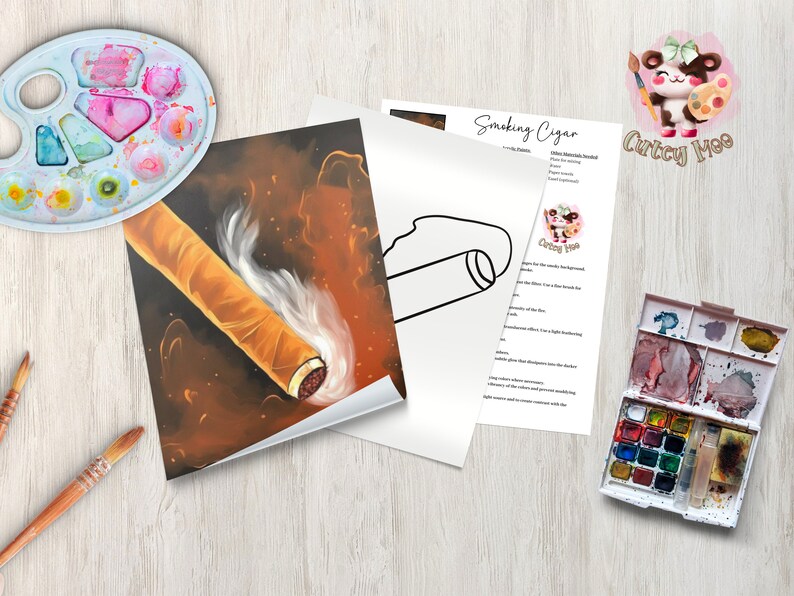 a table topped with art supplies and a painting