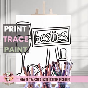 May include: A black and white line drawing of a wine glass, a sign that says "besties", and paintbrushes in a jar. The text "PRINT TRACE PAINT" is at the top of the image. The text "HOW TO TRANSFER INSTRUCTIONS INCLUDED" is at the bottom of the image.