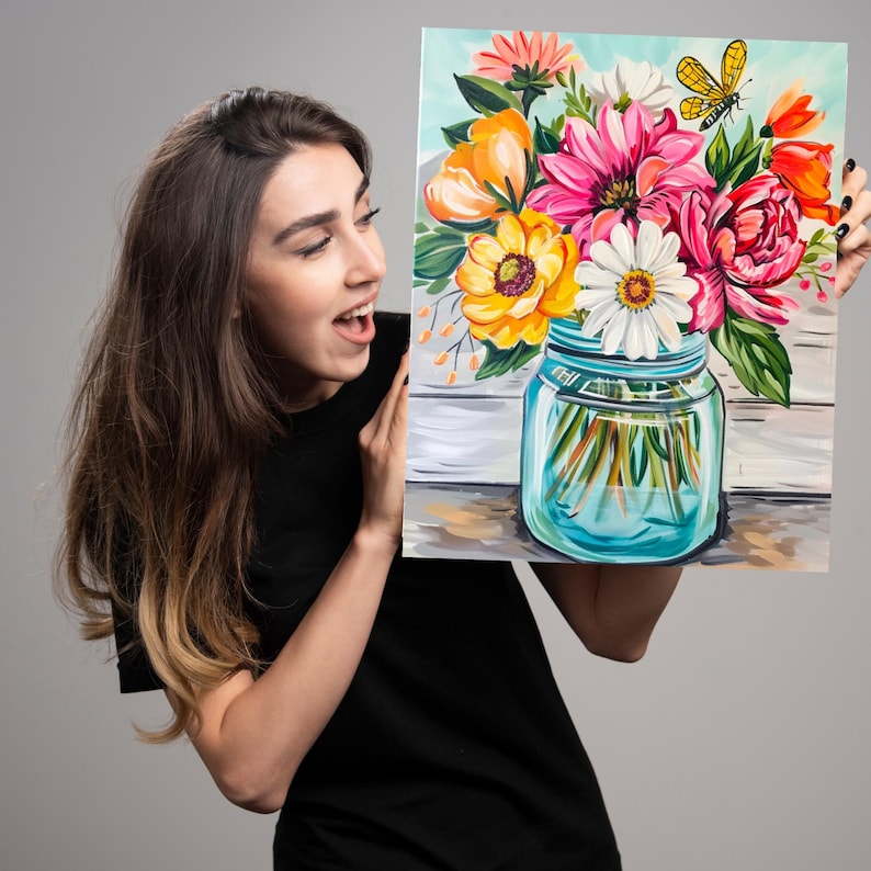 May include: A painting of a colorful flower bouquet in a blue mason jar. The flowers are pink, yellow, orange, and white. The background is a light blue and white wooden plank.