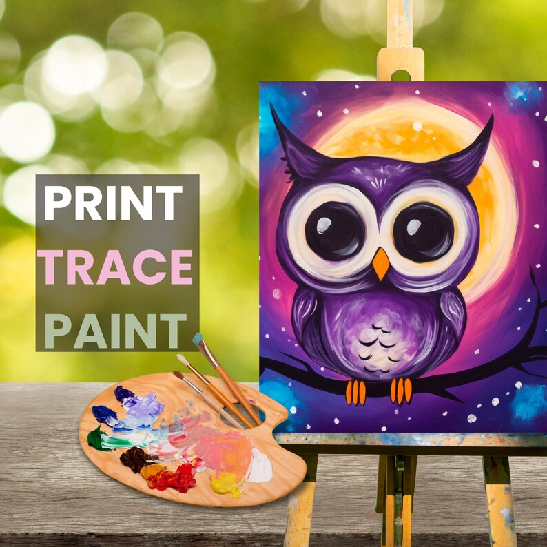 May include: A purple owl with large eyes is painted on a canvas with a yellow moon and purple starry sky in the background. The canvas is on an easel with a wooden paint palette and paintbrushes in front of it. The text "PRINT TRACE PAINT" is in the foreground.