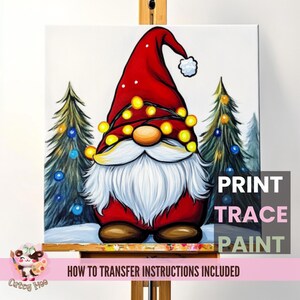 May include: Printable painting template featuring a gnome wearing a red hat with white trim and a white beard. The gnome is decorated with yellow Christmas lights and is standing in front of two green Christmas trees with blue and yellow ornaments. The text "PRINT TRACE PAINT" is in the bottom right corner of the image.