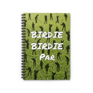 May include: A green and white spiral notebook with a golf theme. The cover features a green grass background with silhouettes of golfers and the text "Birdie Birdie Par".