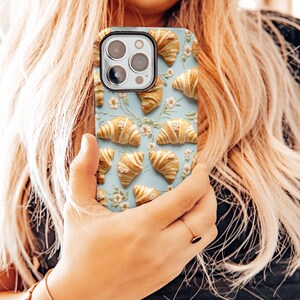 cute croissant phone case embroidered embroidery flowers girly feminine foodie chef cook gift for mom france french food samsung galaxy pixel iphone 13 14 15 pro max plus magsafe tough case wireless charging boho aesthetic