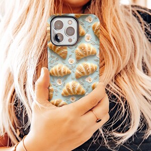 cute croissant phone case embroidered embroidery flowers girly feminine foodie chef cook gift for mom france french food samsung galaxy pixel iphone 13 14 15 pro max plus magsafe tough case wireless charging boho aesthetic