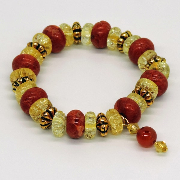 Orange coral and yellow stretch bracelet.