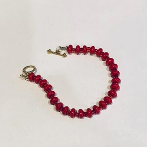 Red and gold beaded 8” bracelet