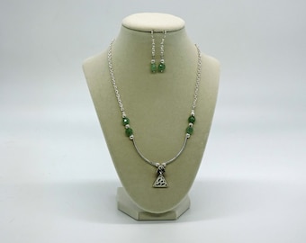 Light green and silver pendant necklace and matching earrings