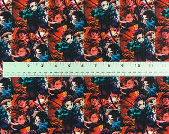 May include: Fabric with a repeating pattern of anime characters in various poses. The design features characters with dark hair, green and black outfits, and red and orange backgrounds. The ruler shows measurements in inches.