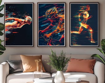 May include: Three abstract art prints featuring athletes in motion. The prints are in a dark blue background with streaks of red, orange, and yellow. The first print shows a swimmer, the second print shows a cyclist, and the third print shows a runner.