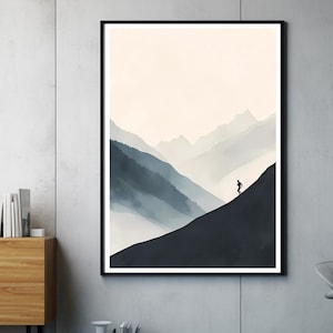 Peut inclure: Une impression d'art numérique minimaliste représentant une seule silhouette marchant sur un sentier de montagne. L'arrière-plan est d'un bleu et d'un blanc doux et tamisé, avec une chaîne de montagnes brumeuse au loin.
